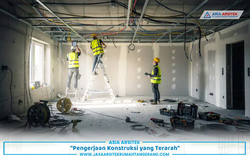 tahapan konstruksi renovasi rumah kantor Tangerang dengan pemasangan instalasi listrik dan plafon